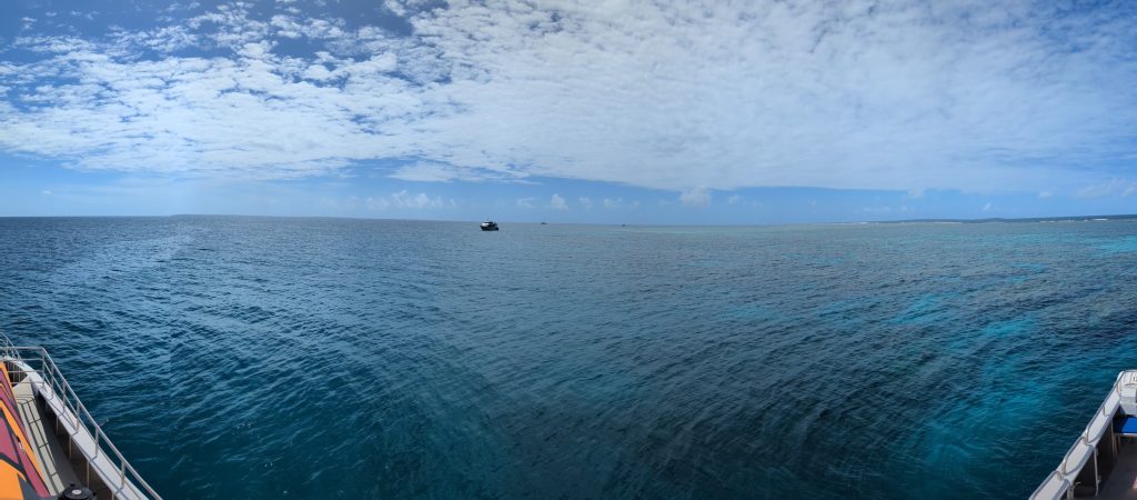 Panorama photo of the ocean, looking out toward the Great Barrier Reef off the east coast of Australia. Part 2 of the Great Aussie Adventure.
