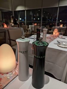 Photo of hand-painted salt and pepper shakers in a restaurant in Uluru Resort, our temporary home during part 3 of our great Aussie adventure
