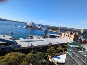Aerial view of the wharf and ocean in the Sydney Harbor.